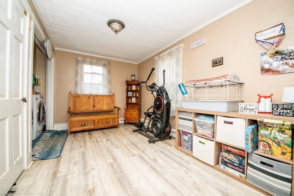 210 Hathaway Road Acushnet, MA 02743 - Photo 15 of 34 a view of a room with gym equipment