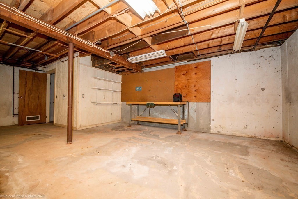 210 Hathaway Road Acushnet, MA 02743 - Photo 29 of 34 a view of a room with wooden walls