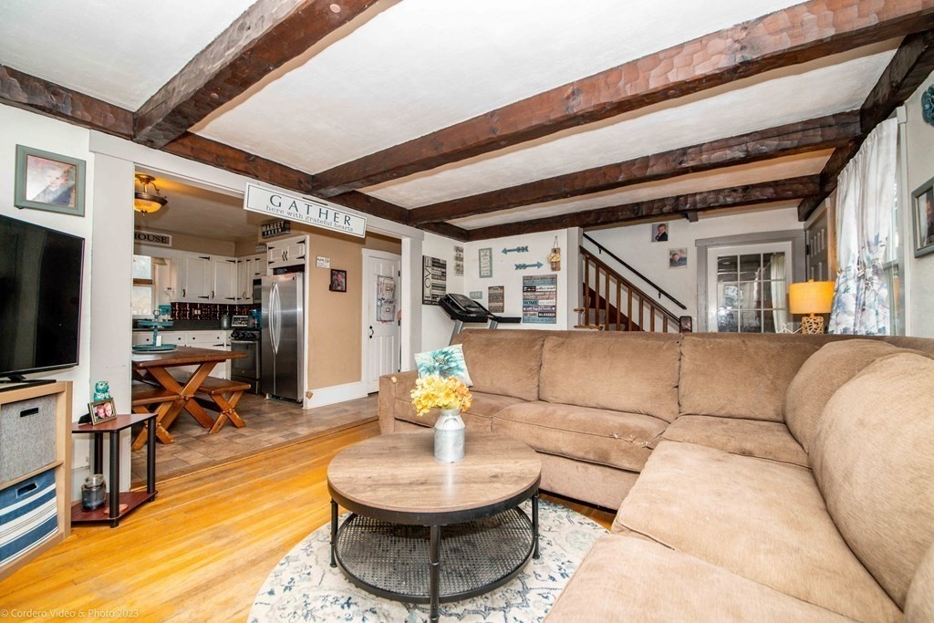 210 Hathaway Road Acushnet, MA 02743 - Photo 5 of 34 a living room with furniture and a flat screen tv