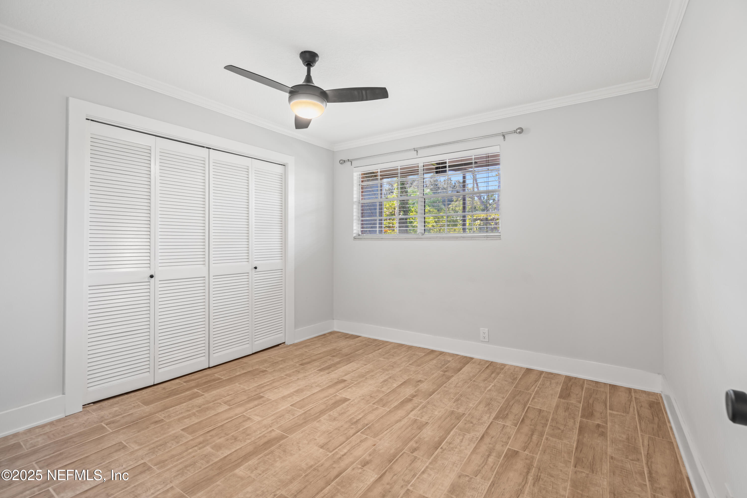 22 Comares Avenue, Unit 4A St. Augustine, FL 32080 - Photo 15 of 36 a view of empty room with wooden floor