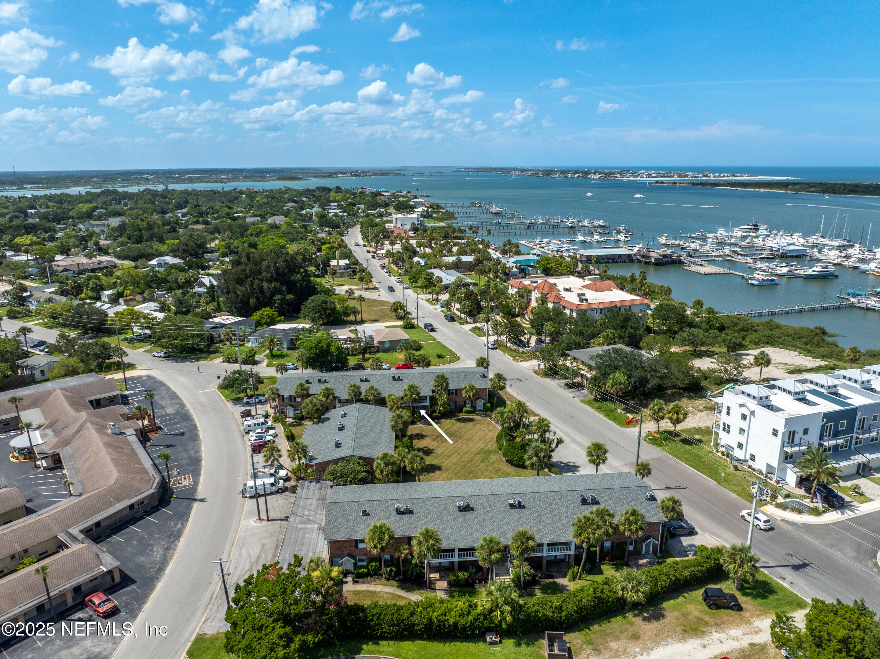 22 Comares Avenue, Unit 4A St. Augustine, FL 32080 - Photo 29 of 36 an aerial view of a city with lots of residential buildings ocean and mountain view in back