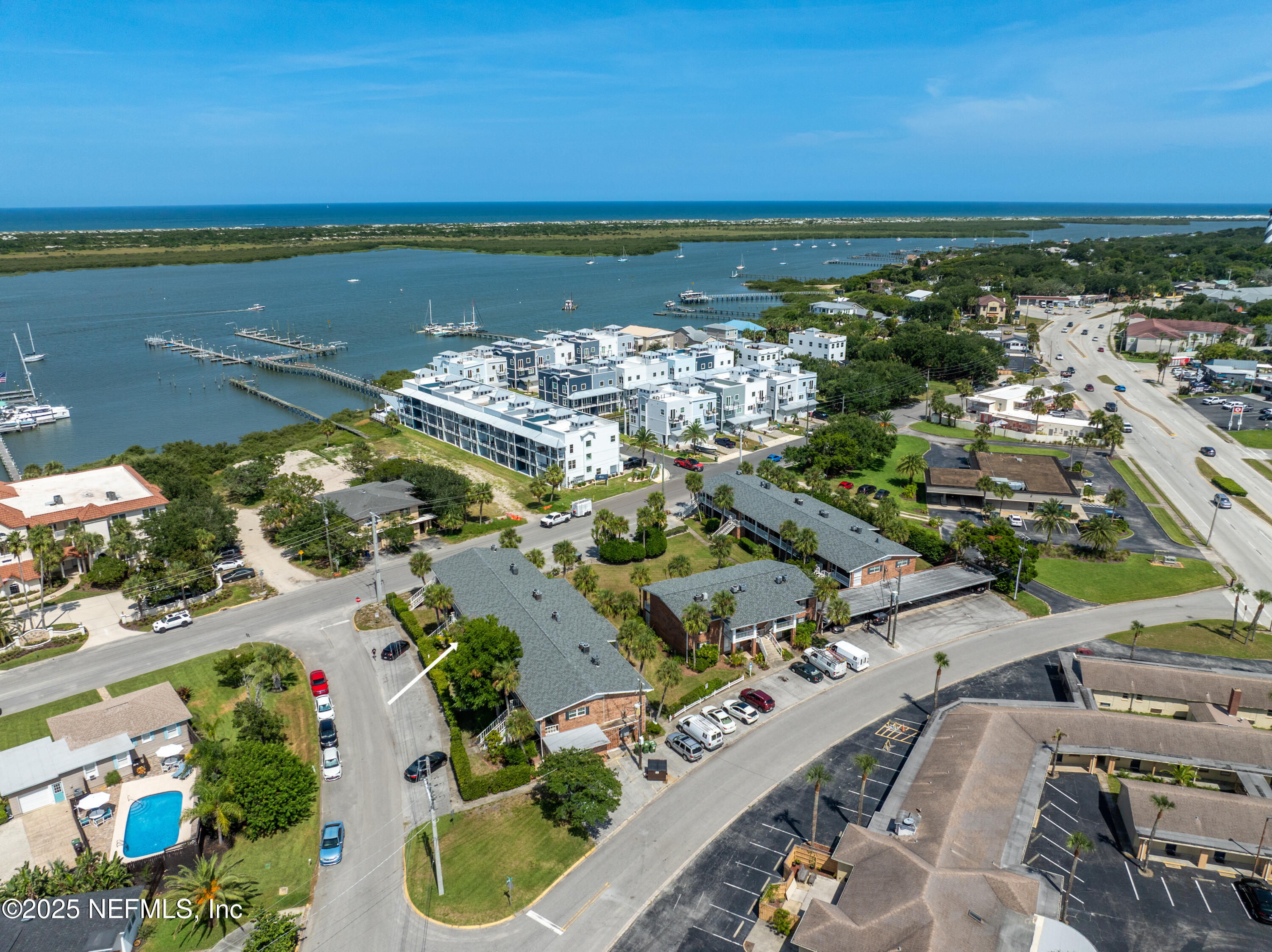 22 Comares Avenue, Unit 4A St. Augustine, FL 32080 - Photo 34 of 36 an aerial view of ocean and residential houses with outdoor space