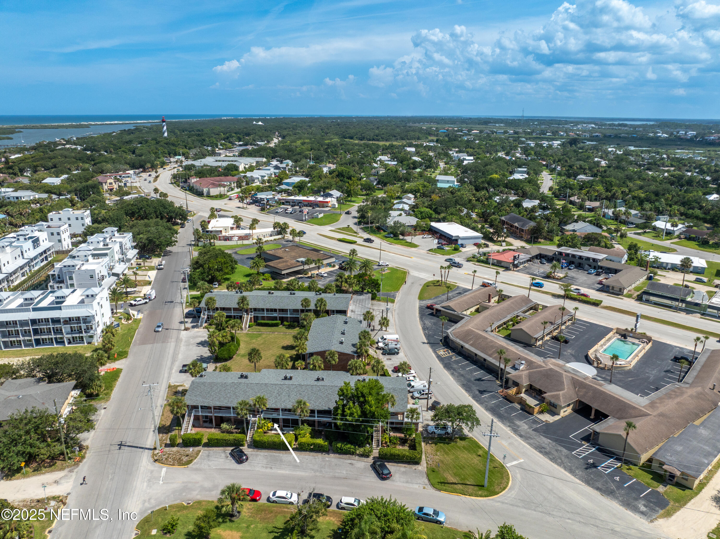 22 Comares Avenue, Unit 4A St. Augustine, FL 32080 - Photo 36 of 36 an aerial view of a city with lots of residential buildings and ocean view in back