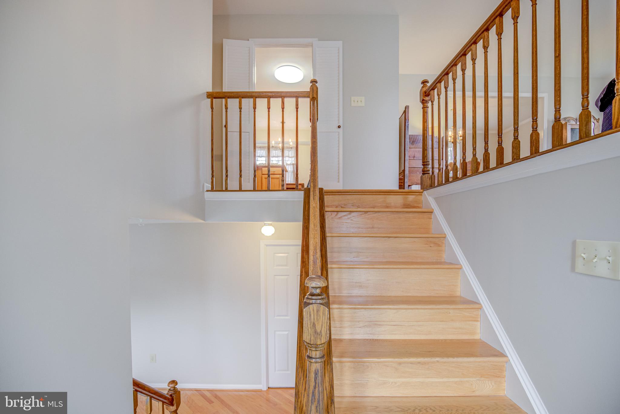 8921 Renshaw Court Springfield, VA 22153 - Photo 12 of 42 hardwood flooring at staircase