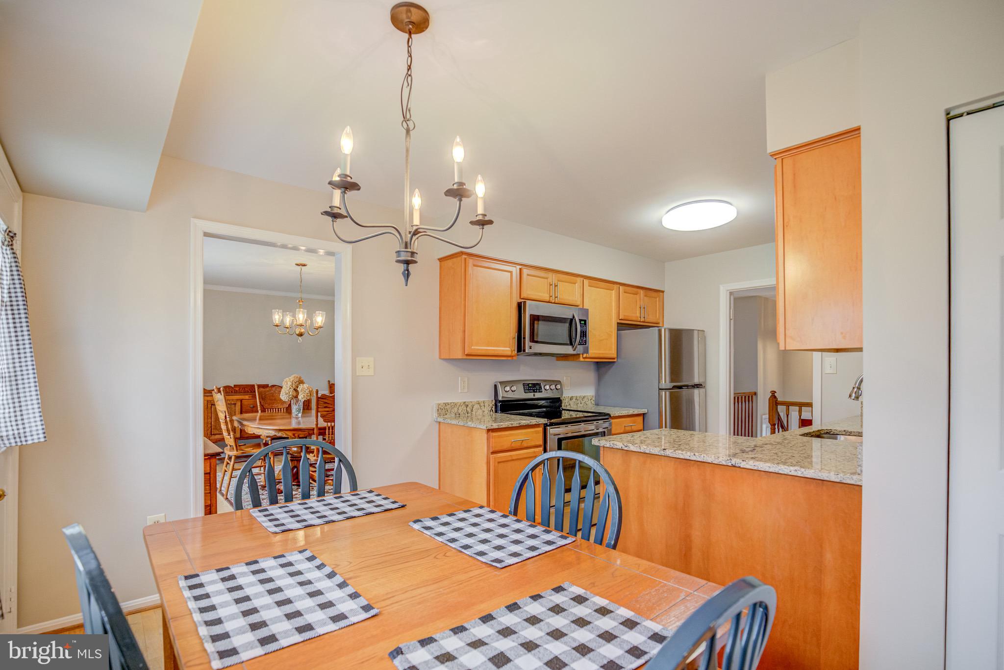 8921 Renshaw Court Springfield, VA 22153 - Photo 17 of 42 kitchen opens to separate dining room
