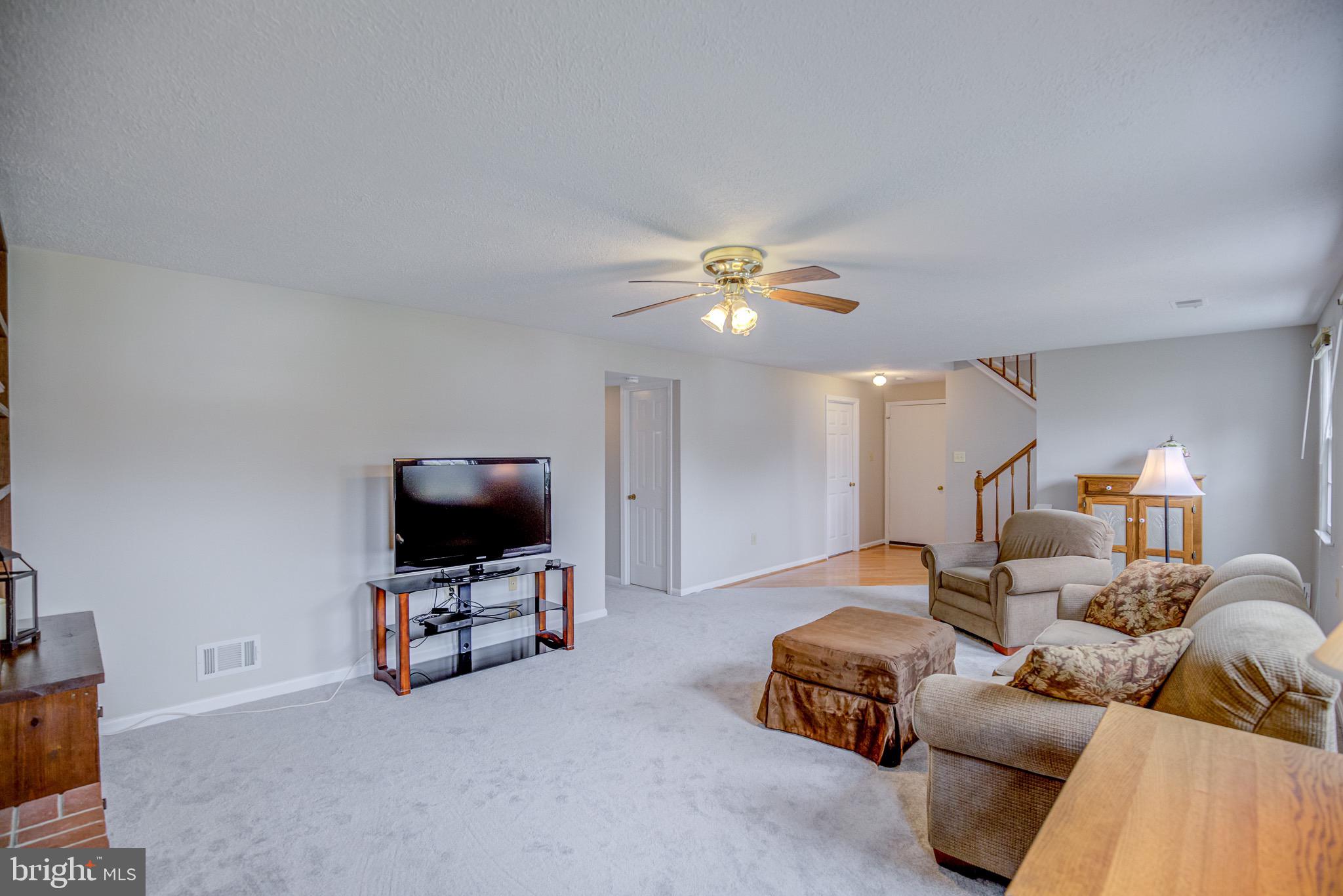 8921 Renshaw Court Springfield, VA 22153 - Photo 34 of 42 Recreation room with new carpet