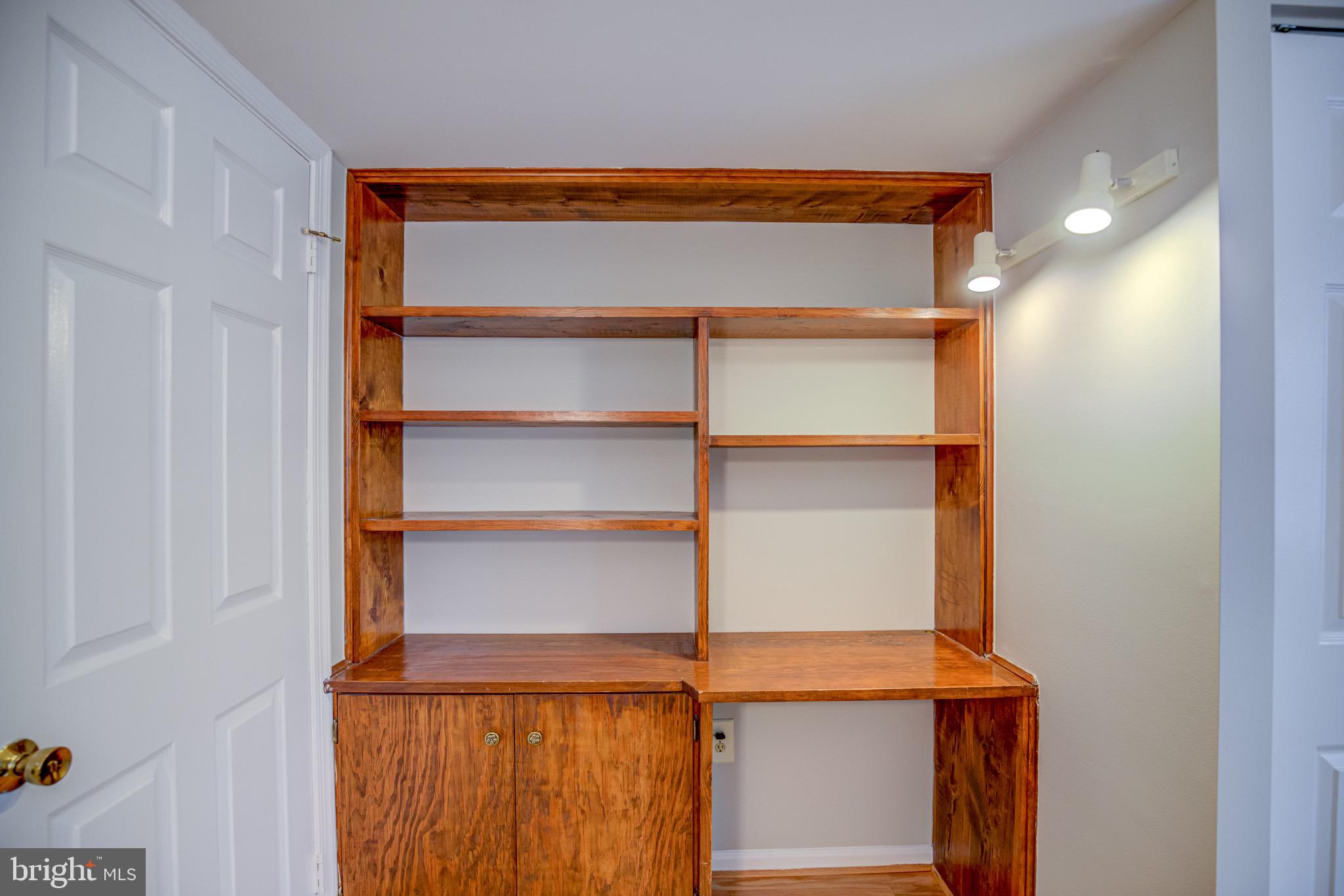 8921 Renshaw Court Springfield, VA 22153 - Photo 38 of 42 Built-in desk and bookcase in Bedroom #4