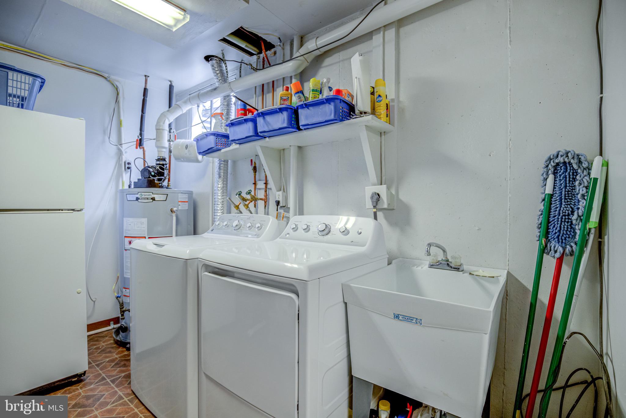 8921 Renshaw Court Springfield, VA 22153 - Photo 42 of 42 Washer/Dryer convey and convenient utility sink