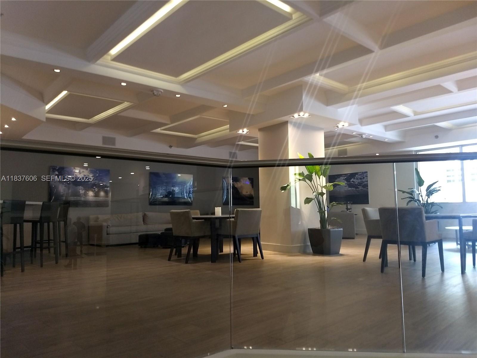 100 Lincoln Road, Unit 1206 Miami Beach, FL 33139 - Photo 15 of 18 a view of a dining room with furniture