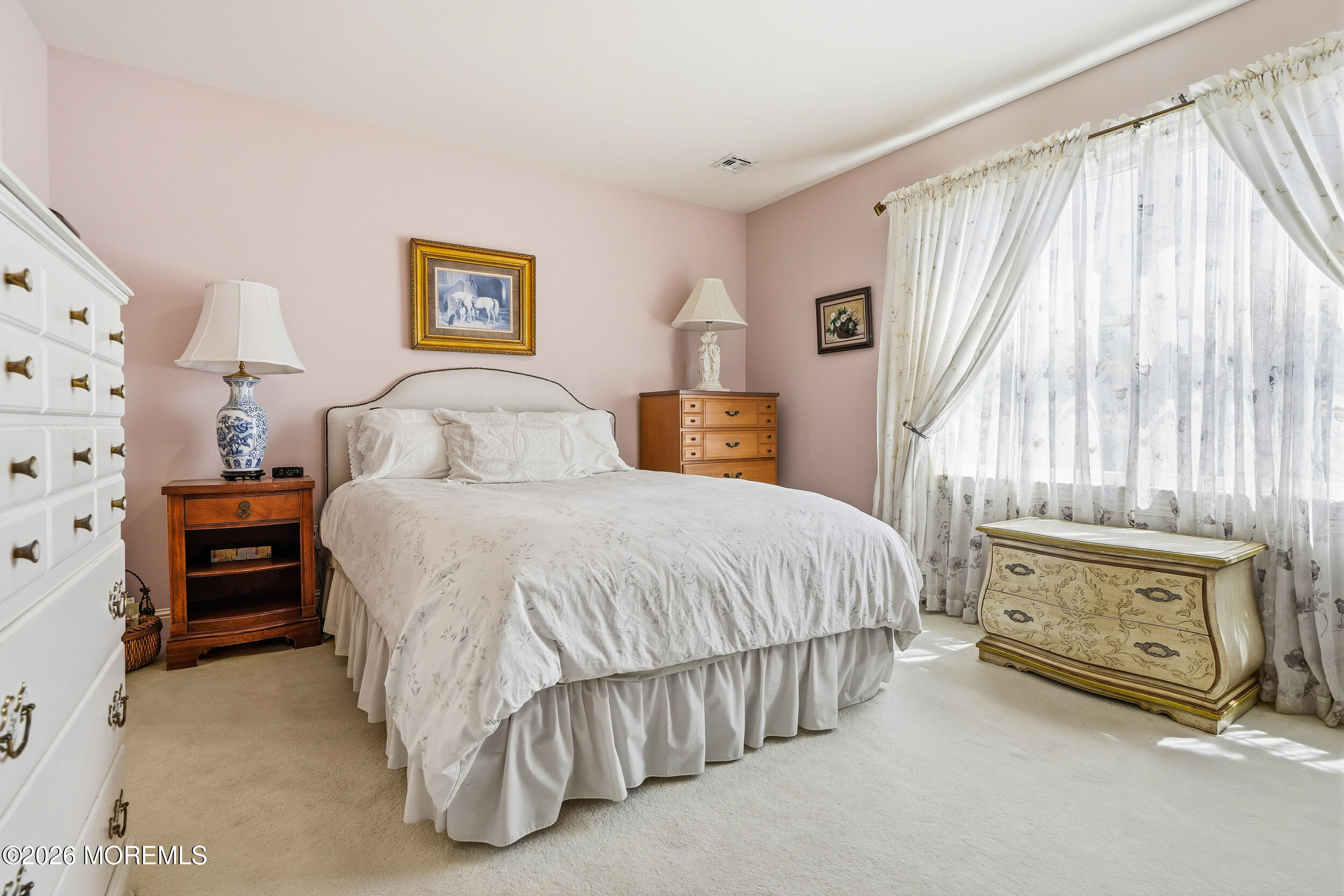 478 Rickey Lane Long Branch, NJ 07740 - Photo 47 of 64 a bedroom with a bed and a cabinets