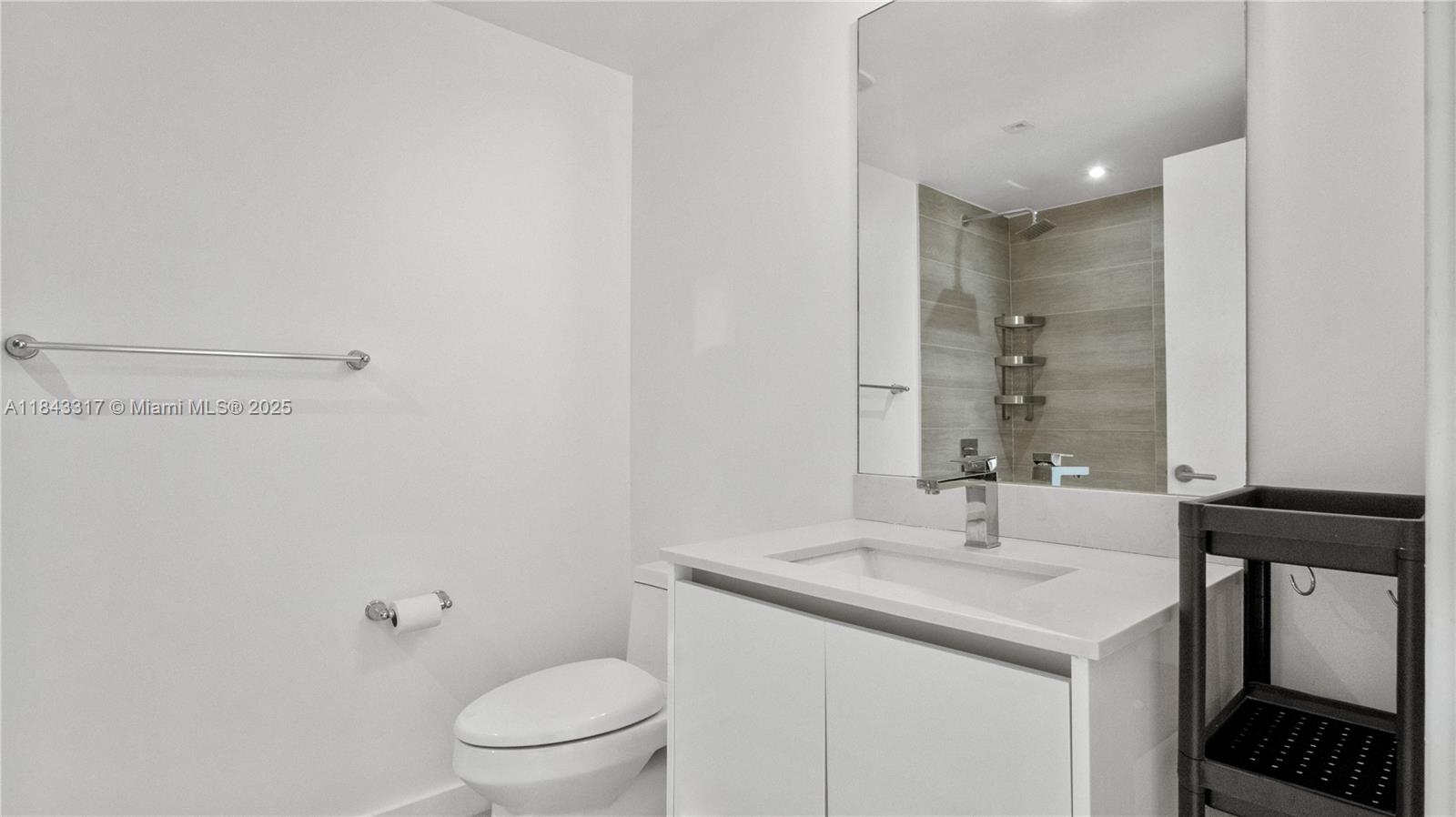 1600 Southwest 1st Avenue, Unit 1104 Miami, FL 33129 - Photo 16 of 22 a bathroom with a sink and a toilet