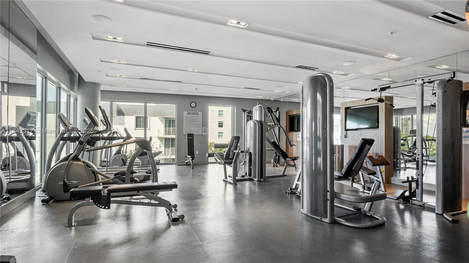 1600 Southwest 1st Avenue, Unit 1104 Miami, FL 33129 - Photo 19 of 22 a view of a room with gym equipment