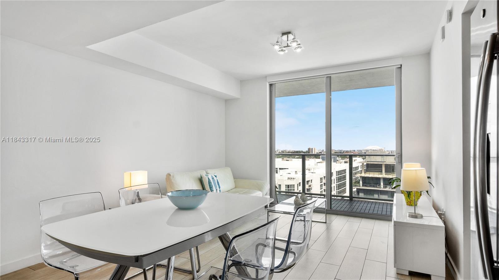 1600 Southwest 1st Avenue, Unit 1104 Miami, FL 33129 - Photo 6 of 22 a view of a dining room with furniture window and outside view