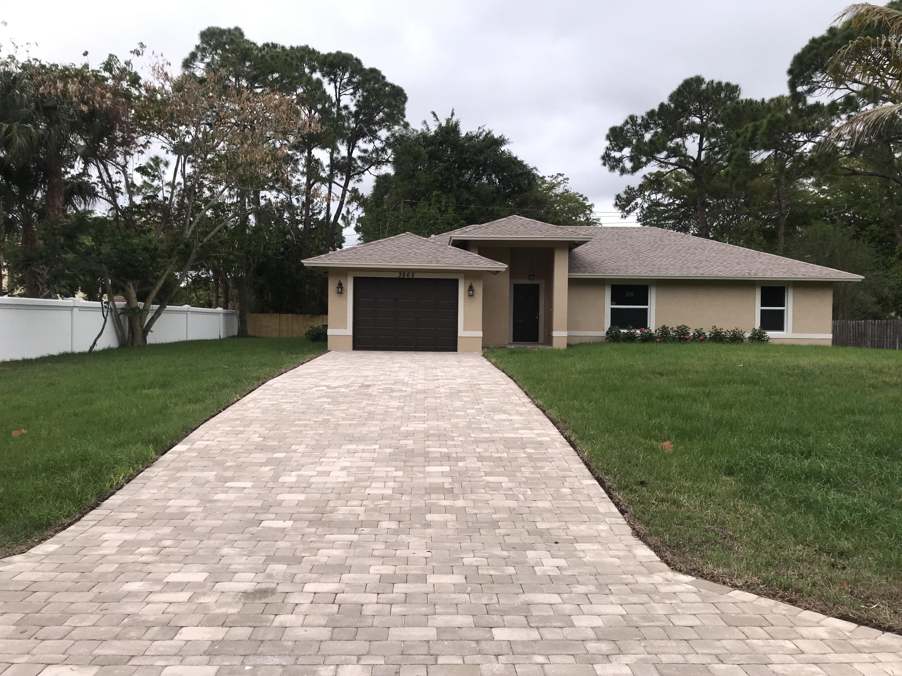 3865 Suncrest Road Lake Worth, FL 33467 - Photo 1 of 27 Front