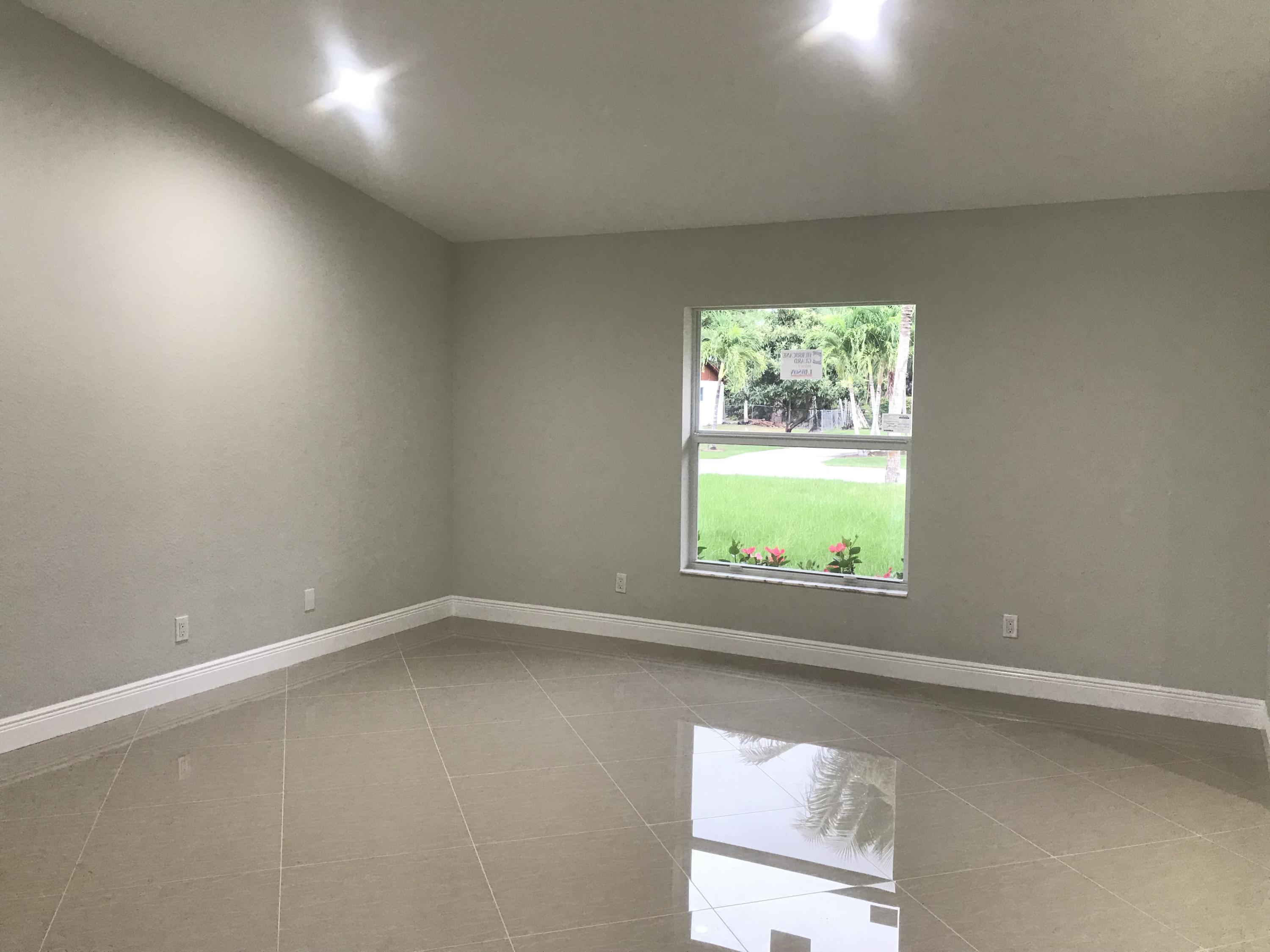 3865 Suncrest Road Lake Worth, FL 33467 - Photo 3 of 27 IMG_0956