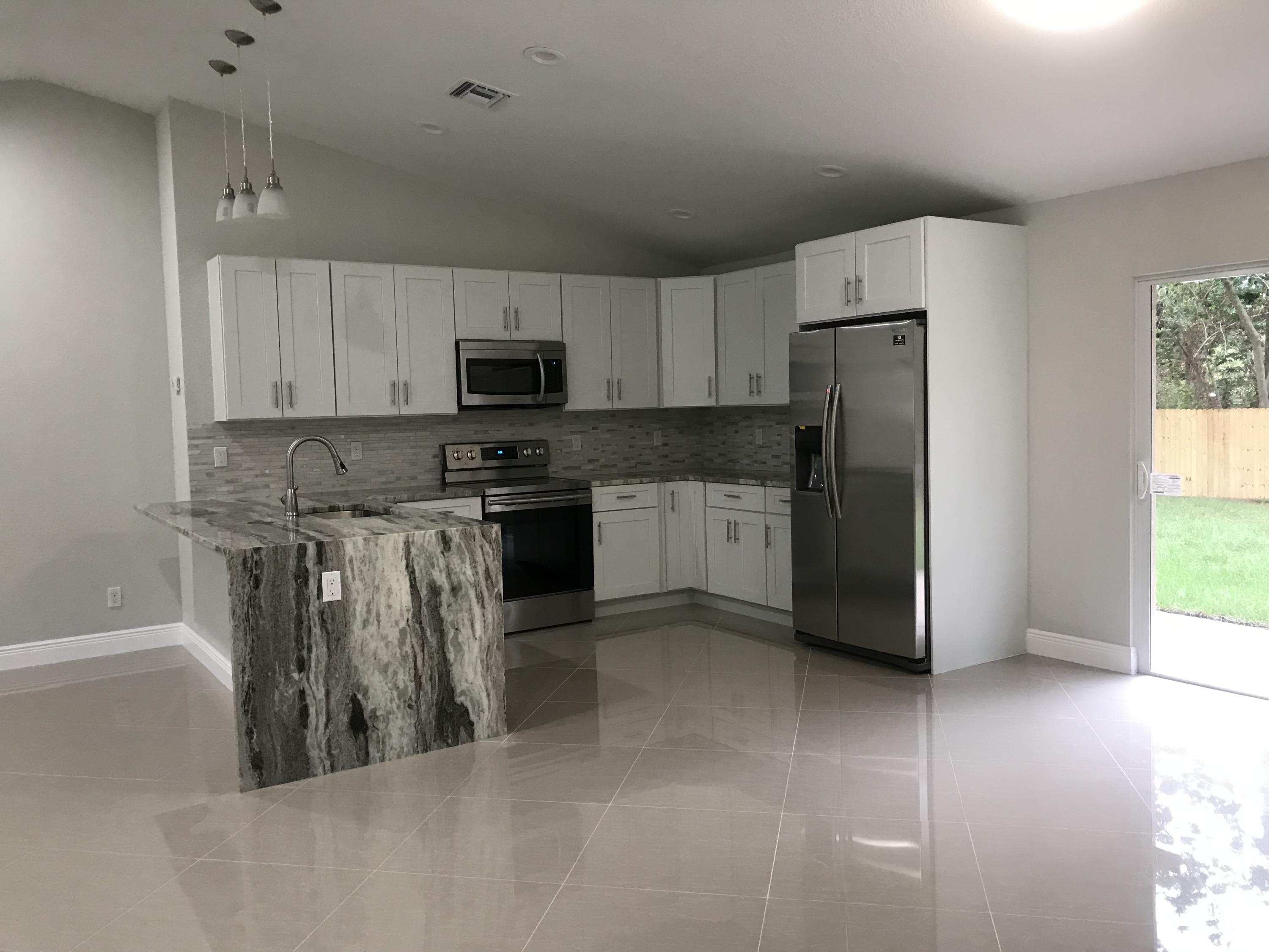 3865 Suncrest Road Lake Worth, FL 33467 - Photo 7 of 27 IMG_0962