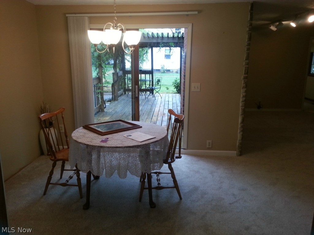 8880 Root Road North Ridgeville, OH 44039 - Photo 16 of 24 fprma; dining area with a view to the deck area. zoom in. its adorable!