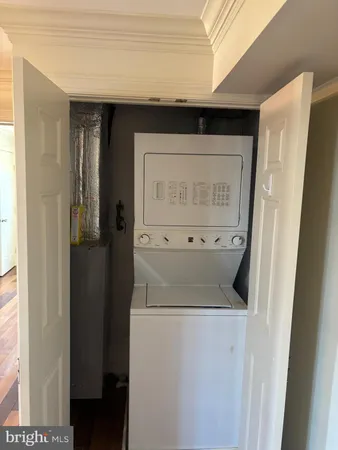 a kitchen with stainless steel appliances granite countertop a refrigerator a sink and dishwasher