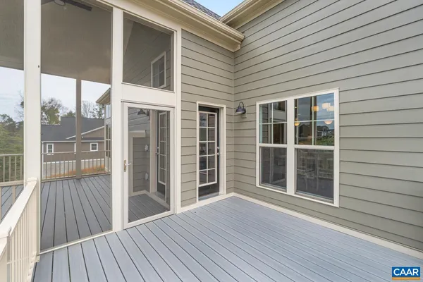 a view of a porch and a yard