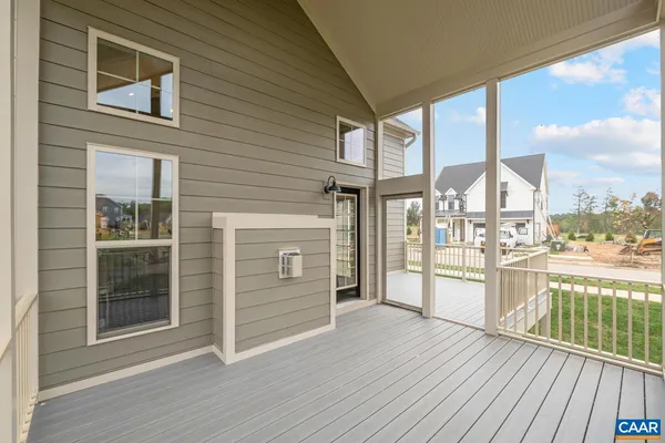 a view of a house with a ocean from a ceiling room