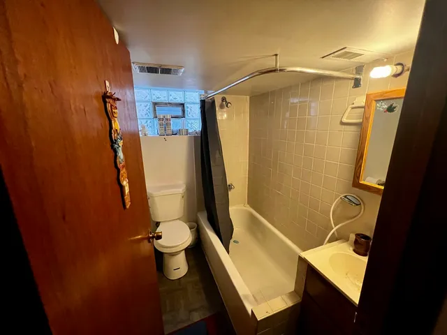 a bathroom with a sink and toilet