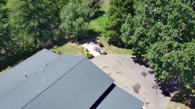 a view of a backyard of a house