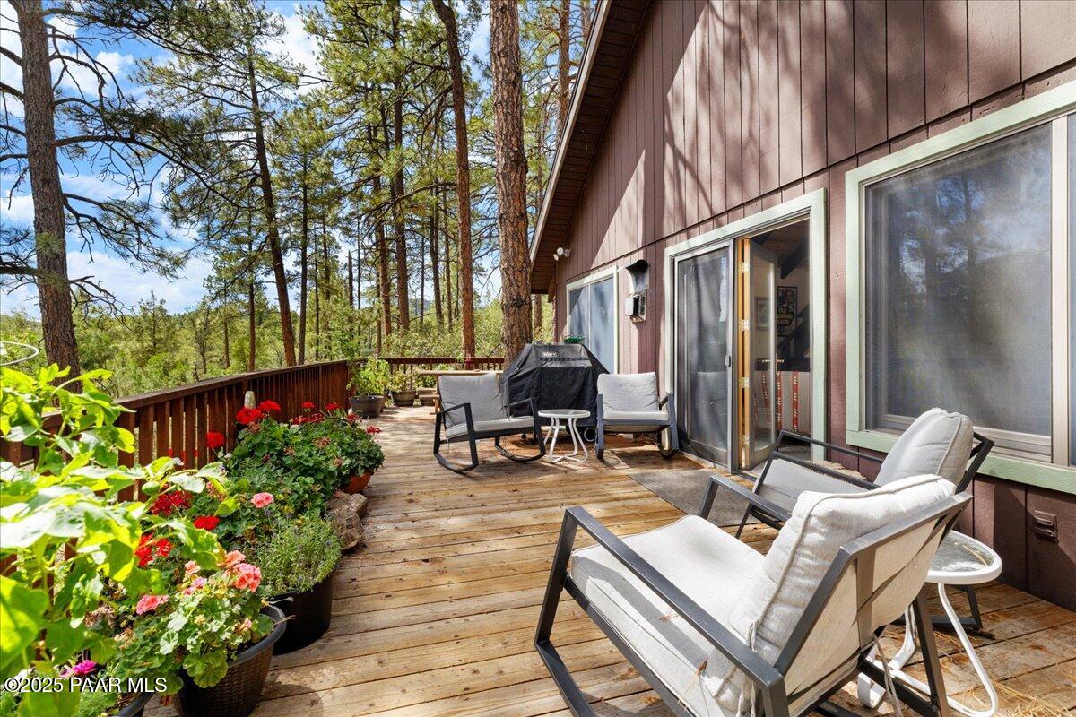 5588 Mountain View Prescott, AZ 86305 - Photo 15 of 45 a view of backyard with seating space and furniture