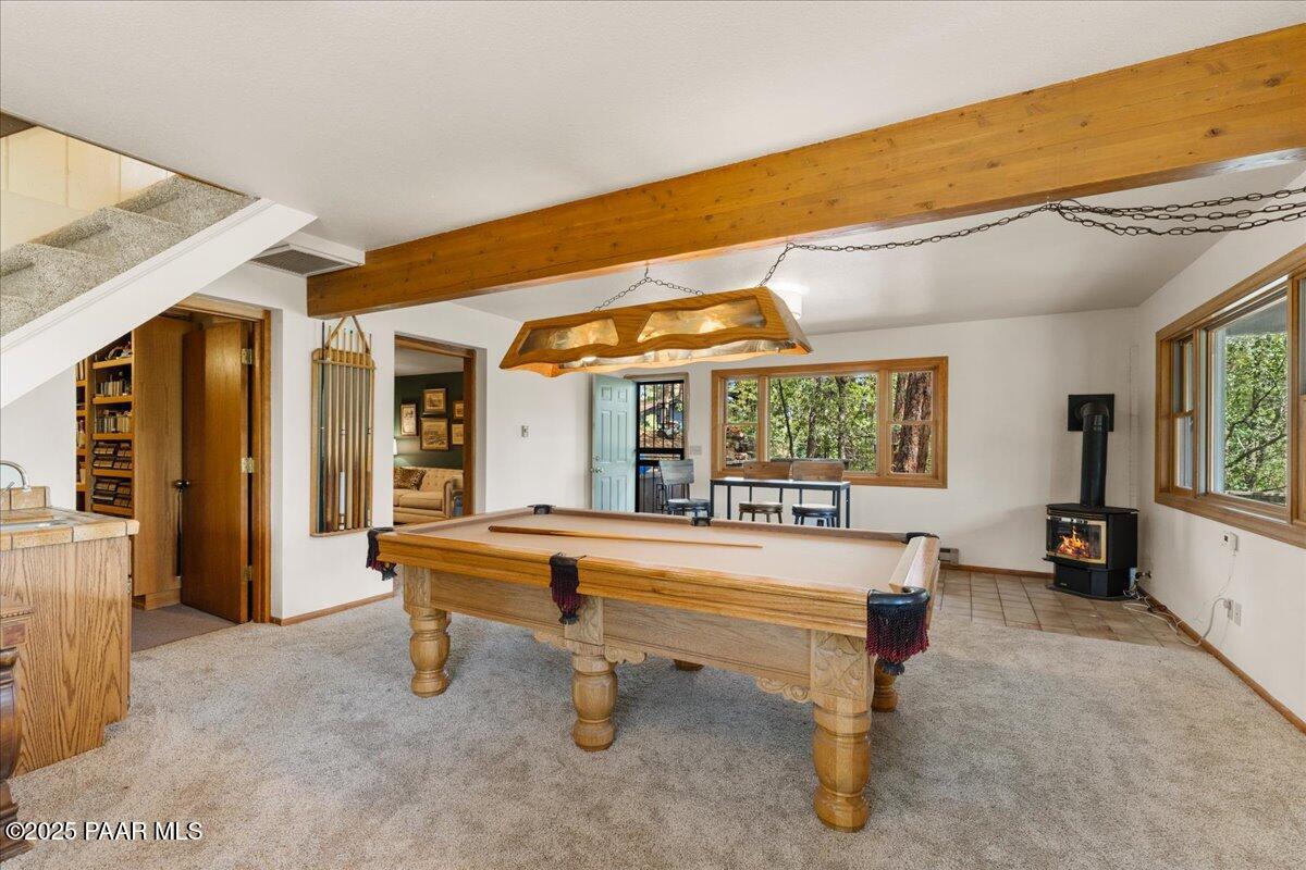 5588 Mountain View Prescott, AZ 86305 - Photo 23 of 45 a living room with furniture a table and large windows