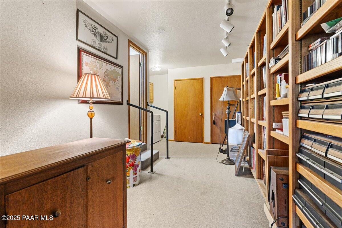 5588 Mountain View Prescott, AZ 86305 - Photo 27 of 45 a view of walk in closet with clothes and shoes