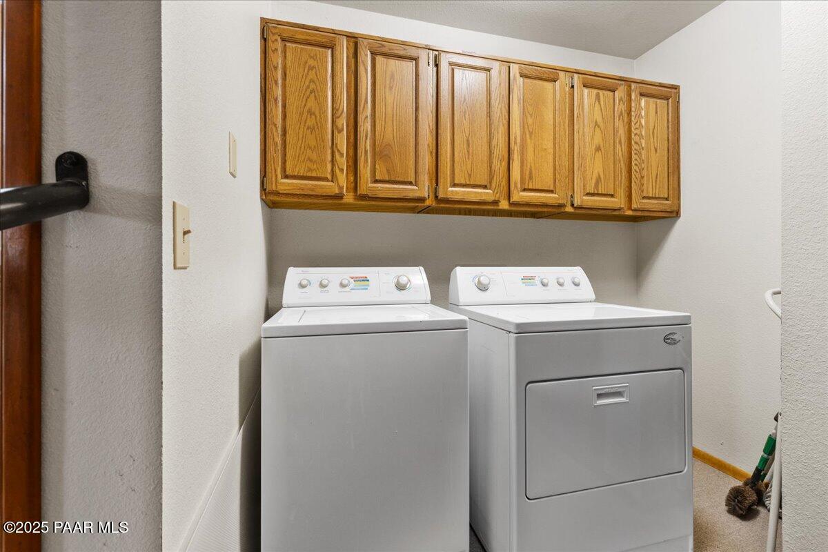 5588 Mountain View Prescott, AZ 86305 - Photo 28 of 45 a utility room with dryer and washer
