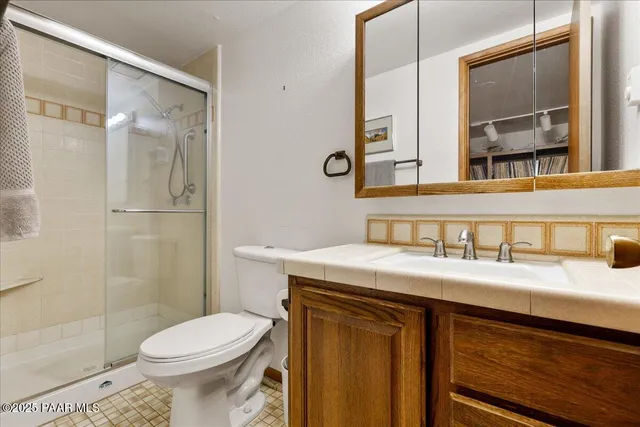 a view of a balcony with chairs