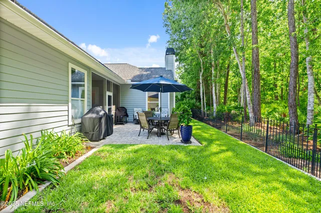 an aerial view of a pool patio swimming pool and outdoor seating