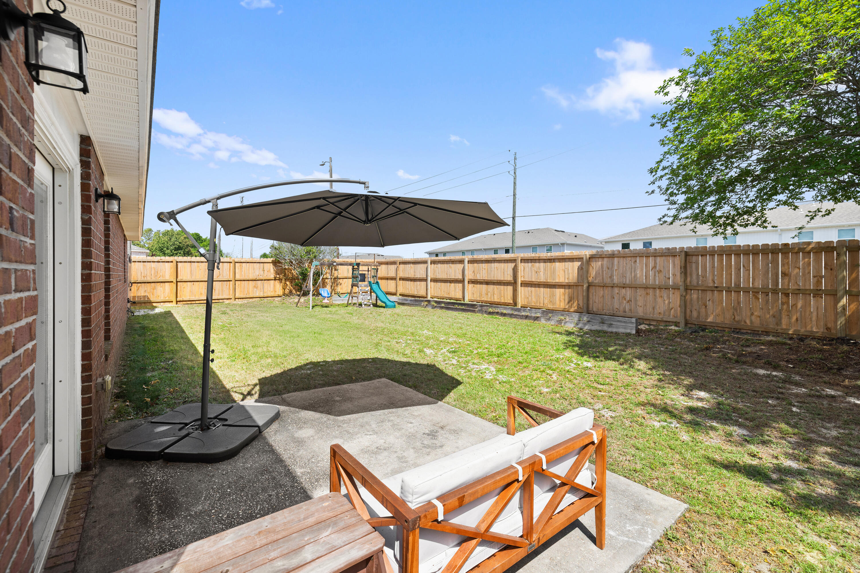 202 Limestone Circle Crestview, FL 32539 - Photo 37 of 49 a view of backyard with seating space