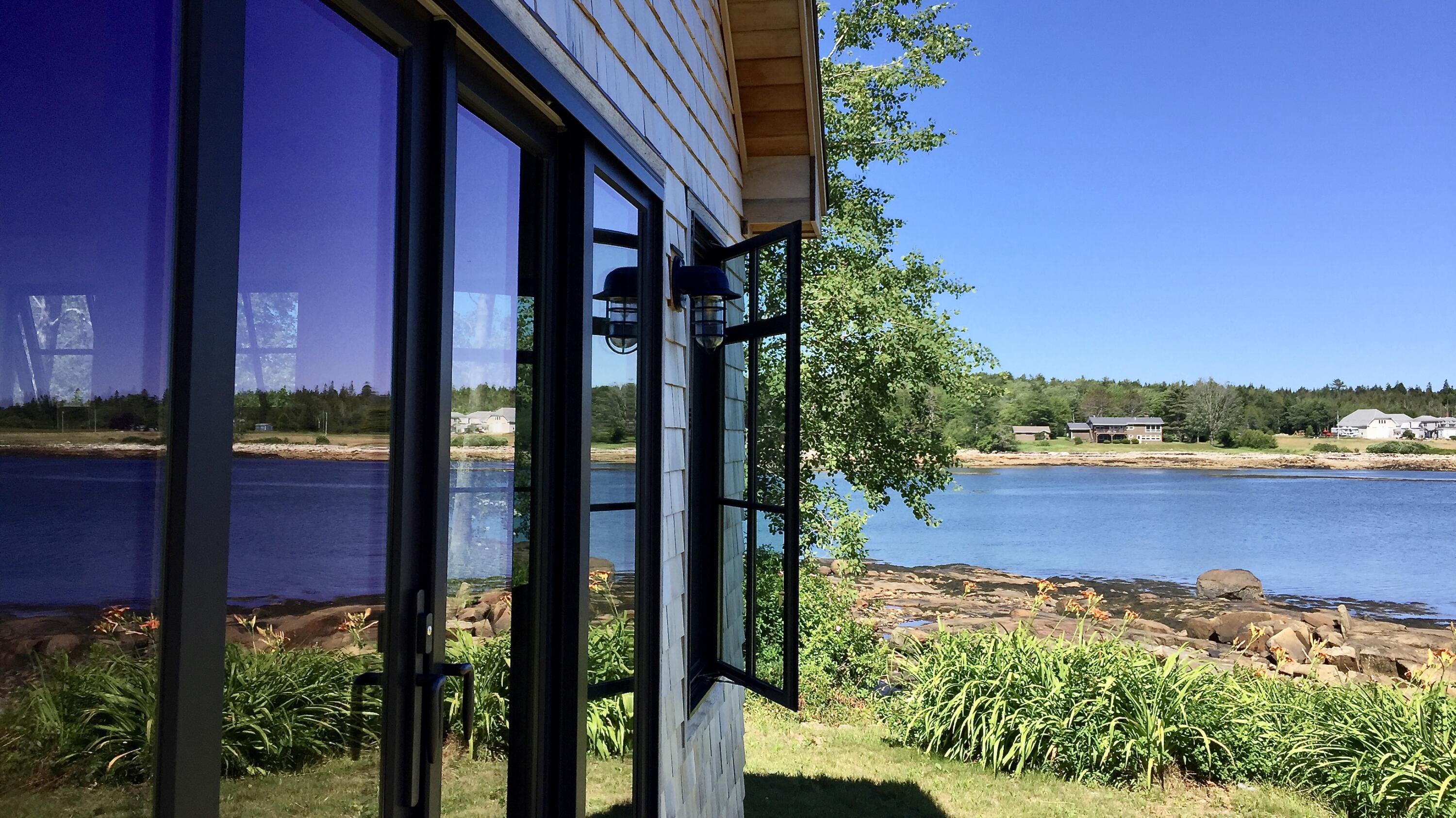 80 Main Street Prospect Harbor, ME 04669 - Photo 45 of 56 Cottage doors and oceanfront
