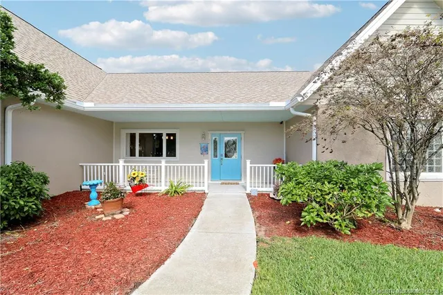 a front view of a house with a porch