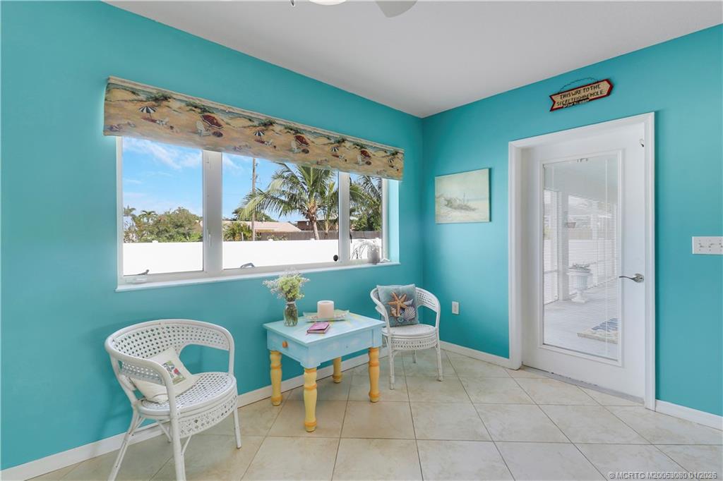 5439 Southeast Horseshoe Point Road Stuart, FL 34997 - Photo 43 of 53 a dining room with furniture and window