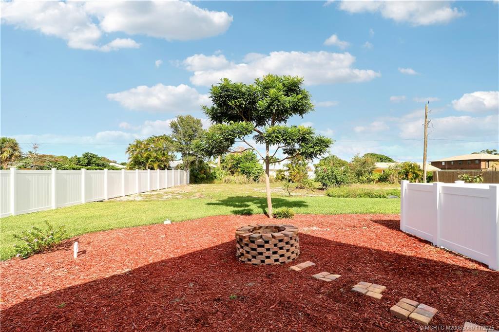 5439 Southeast Horseshoe Point Road Stuart, FL 34997 - Photo 51 of 52 a view of a yard and entertaining space
