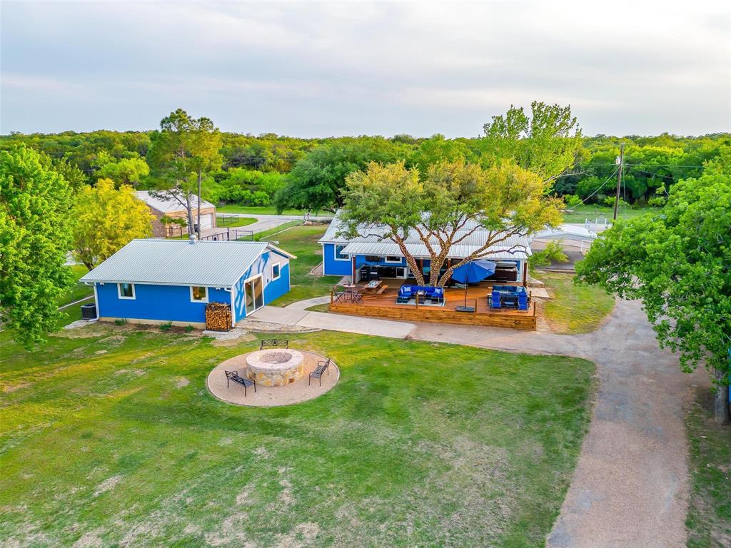 520 Deer Trail Gordon, TX 76453 - Photo 2 of 40 an outdoor space with furniture and garden