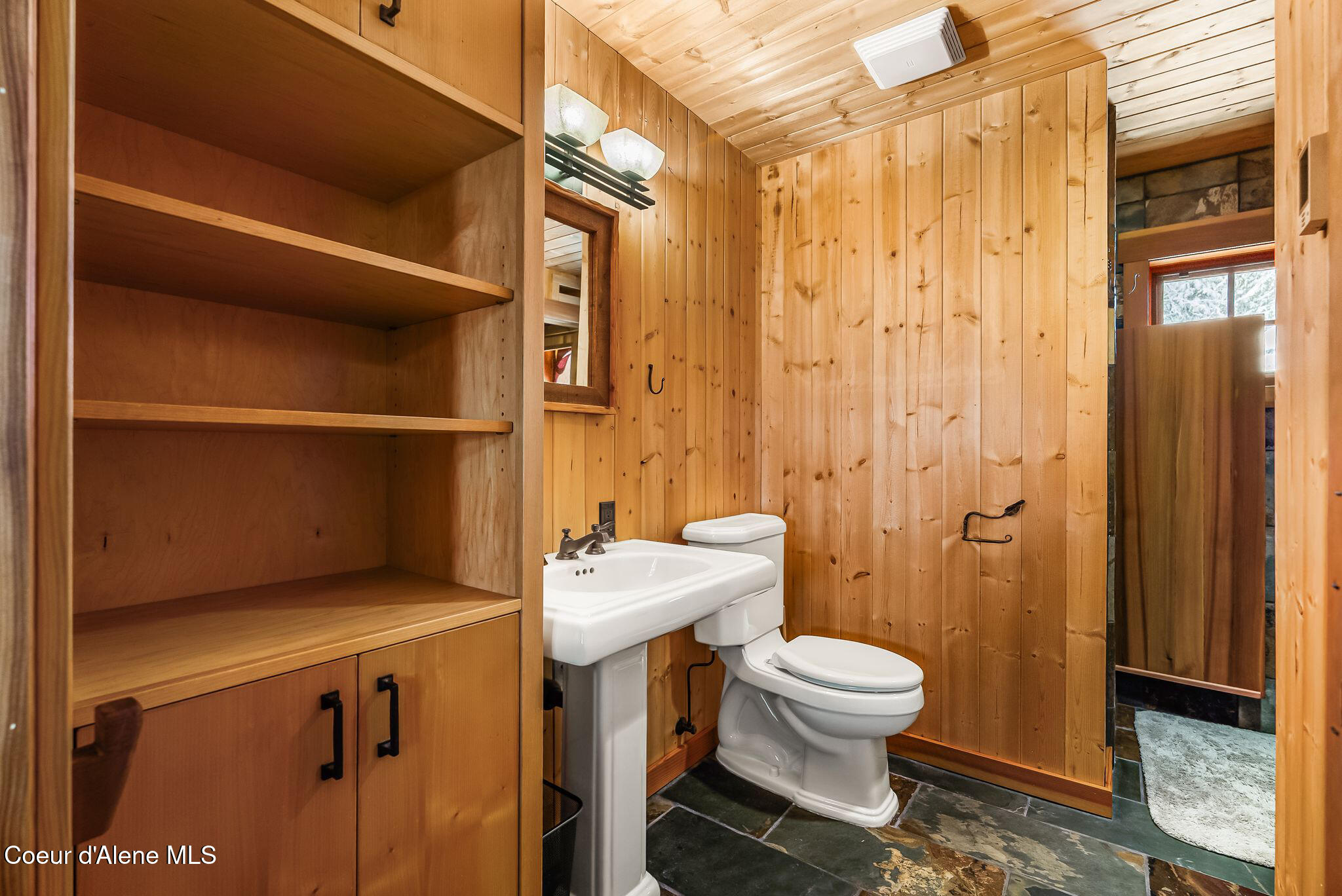 2222 Hidden Valley Road Sandpoint, ID 83864 - Photo 48 of 93 Main level guest bathroom