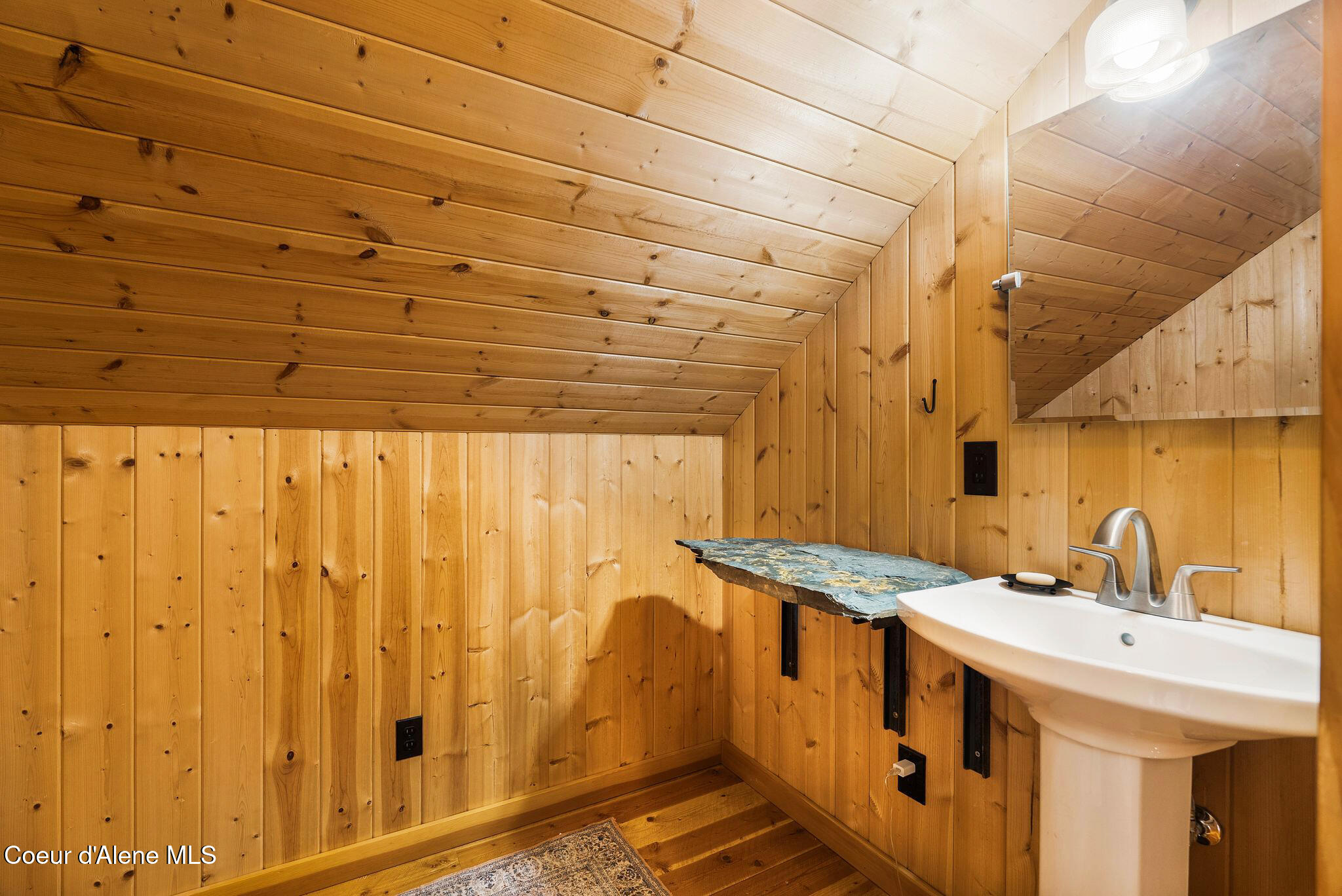 2222 Hidden Valley Road Sandpoint, ID 83864 - Photo 56 of 93 Guest bedroom half bath