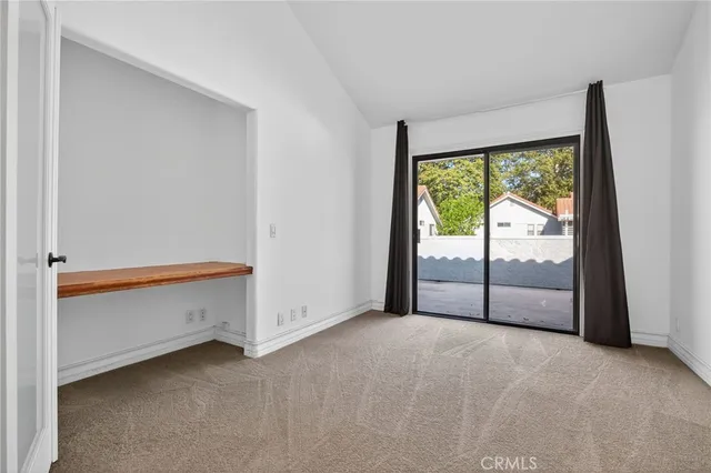 a view of a storage & utility room with two washing machine