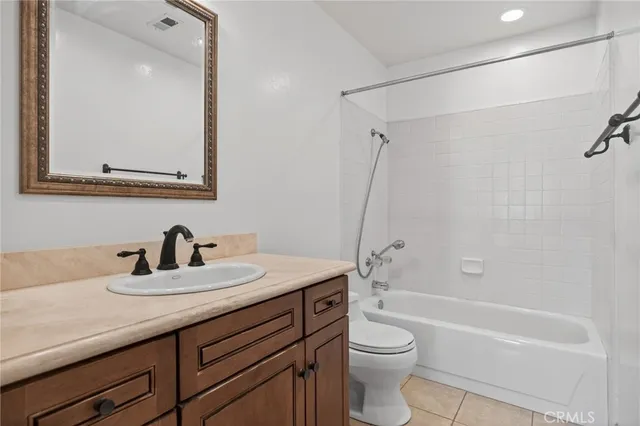 a swimming pool with outdoor seating yard and patio