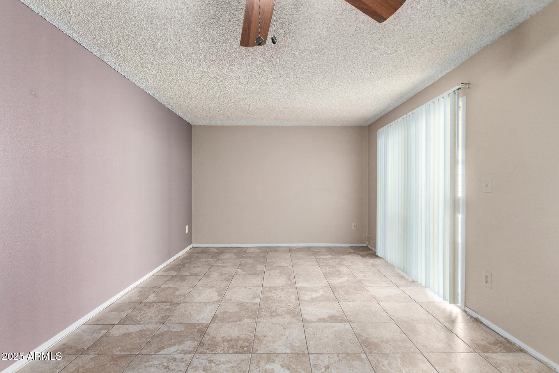 4740 West Bloomfield Road Glendale, AZ 85304 - Photo 8 of 34 an empty room with windows