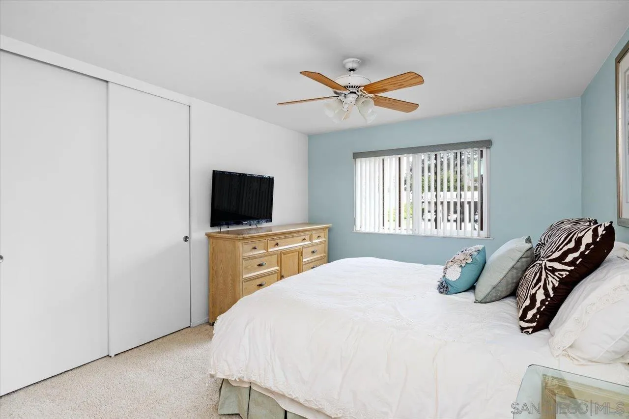 12491 Rios Road Rancho Bernardo, CA 92128 - Photo 16 of 21 a bedroom with a bed and a television