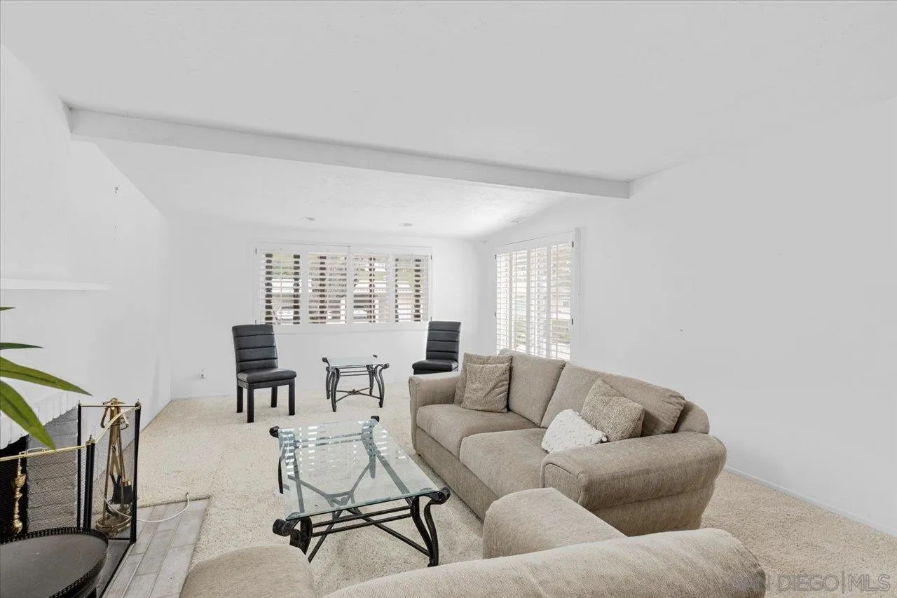 12491 Rios Road Rancho Bernardo, CA 92128 - Photo 6 of 21 a living room with furniture and wooden floor
