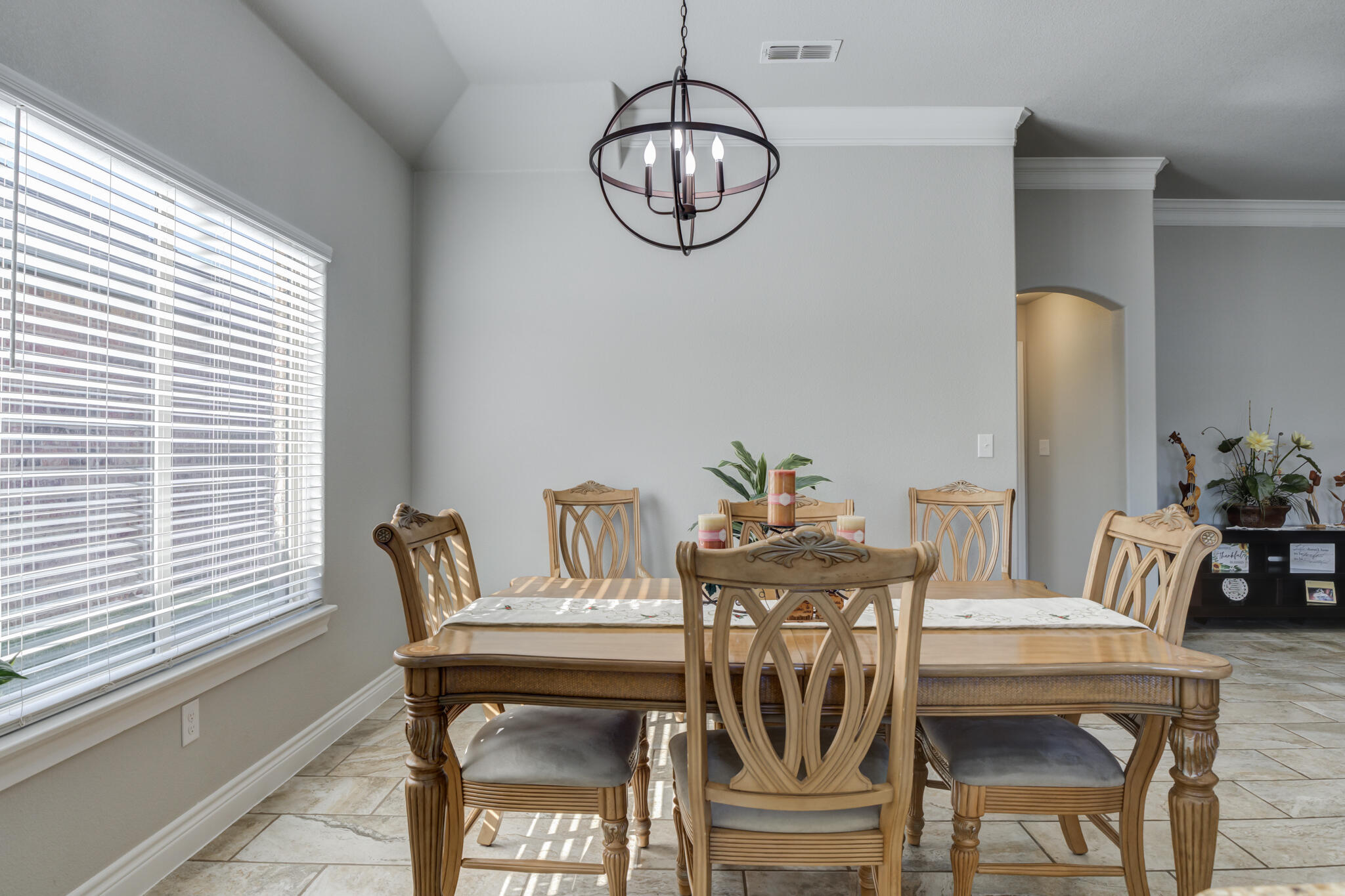 6306 87th Street Lubbock, TX 79424 - Photo 23 of 47 a view of a dining room with furniture window and outside view
