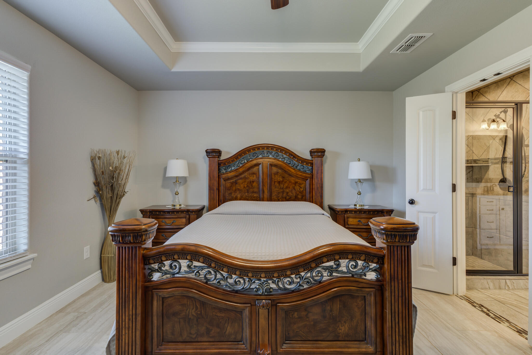 6306 87th Street Lubbock, TX 79424 - Photo 26 of 47 a bedroom with a bed and a dresser