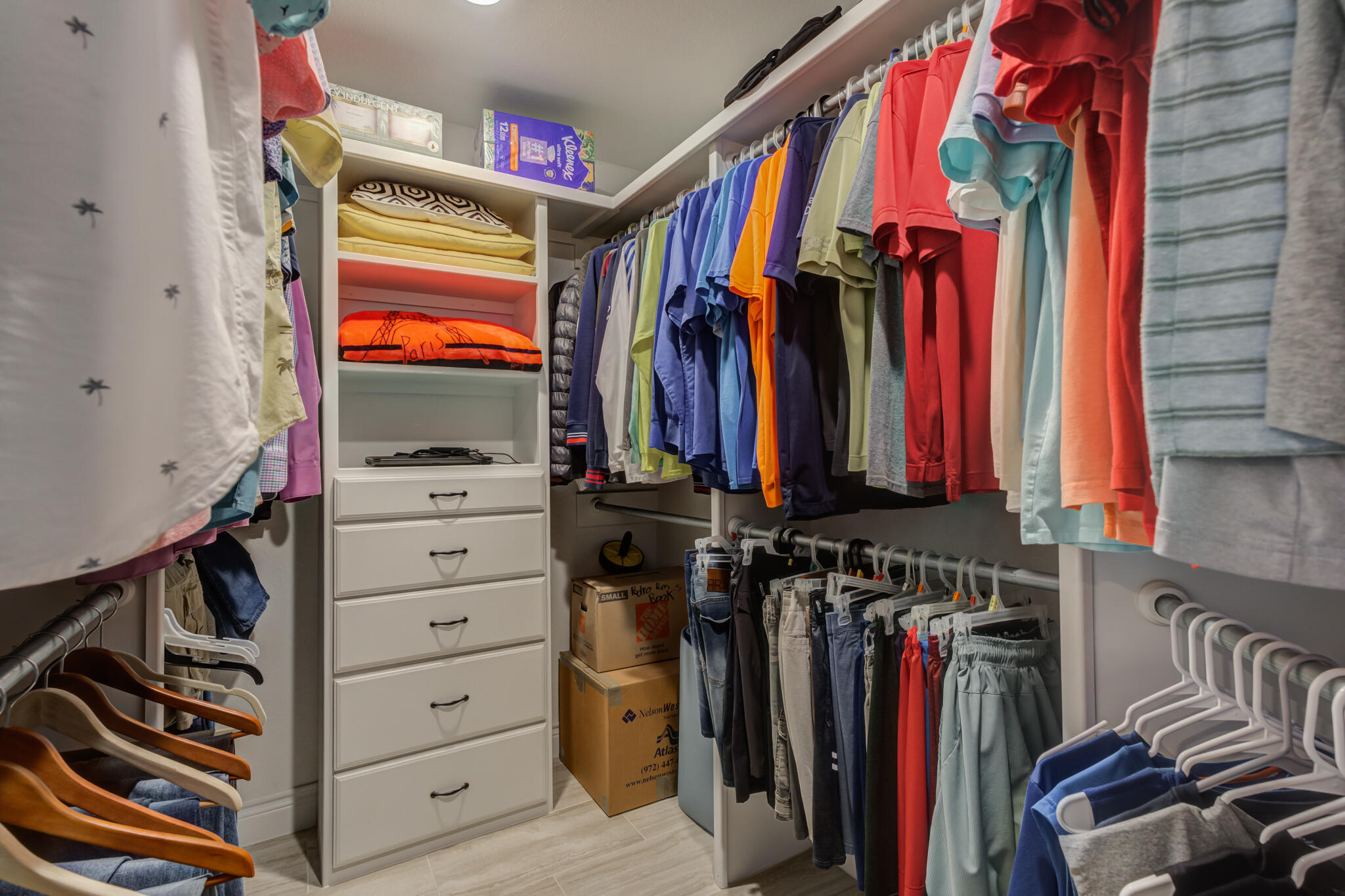 6306 87th Street Lubbock, TX 79424 - Photo 32 of 47 a view of walk in closet with clothes and shoes