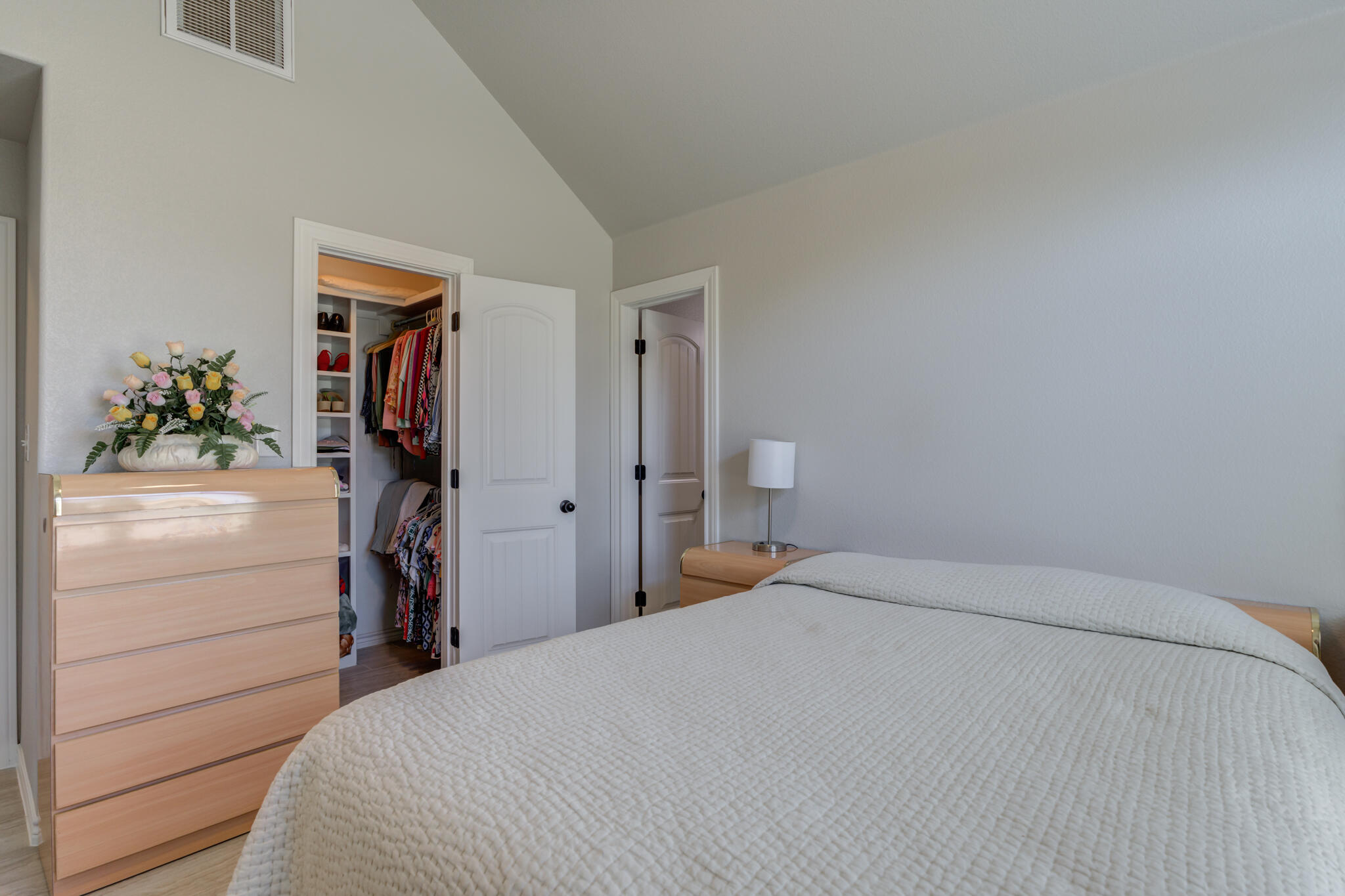 6306 87th Street Lubbock, TX 79424 - Photo 37 of 47 a bedroom with a bed and a closet