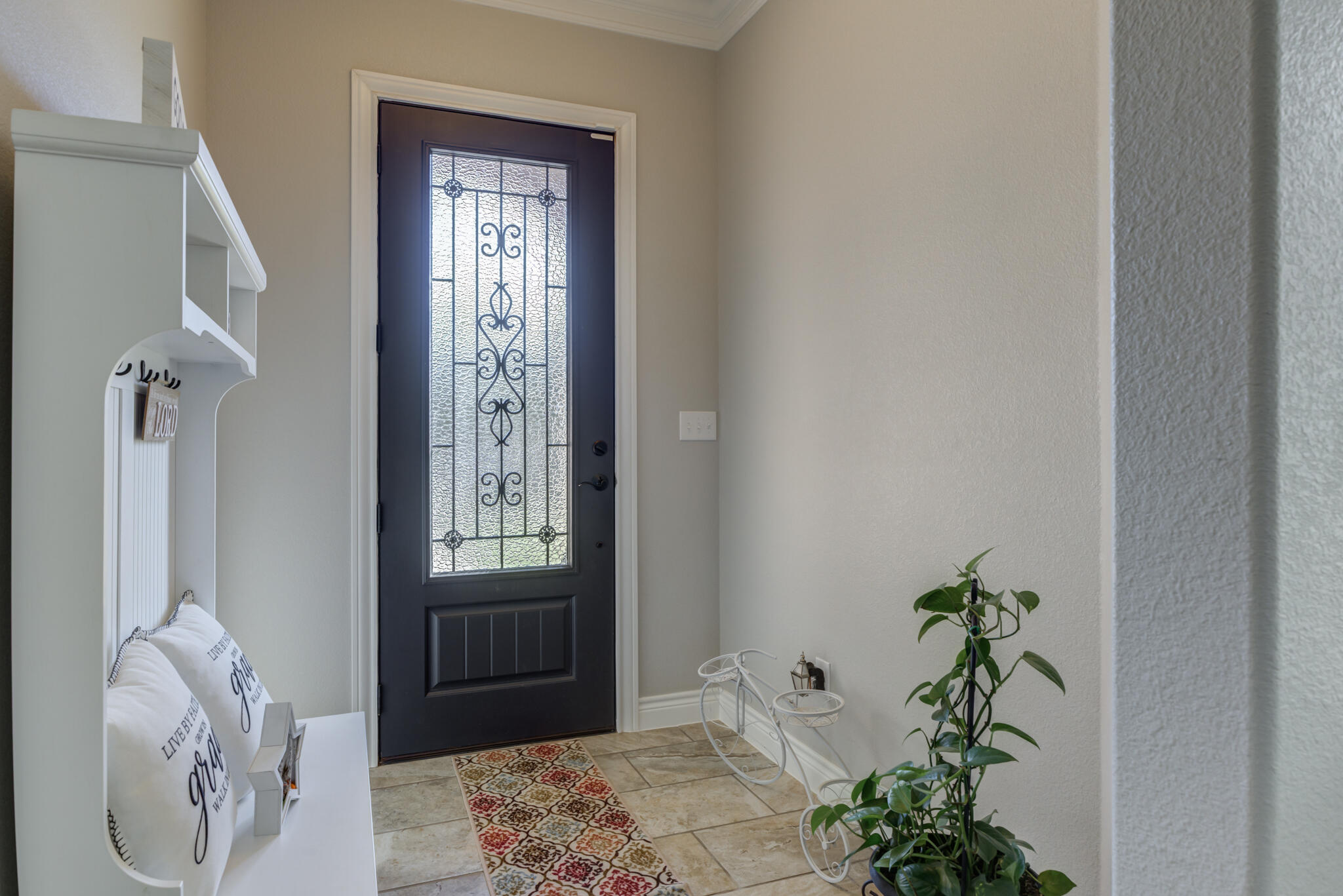 6306 87th Street Lubbock, TX 79424 - Photo 5 of 47 a bedroom with a bed table and a window